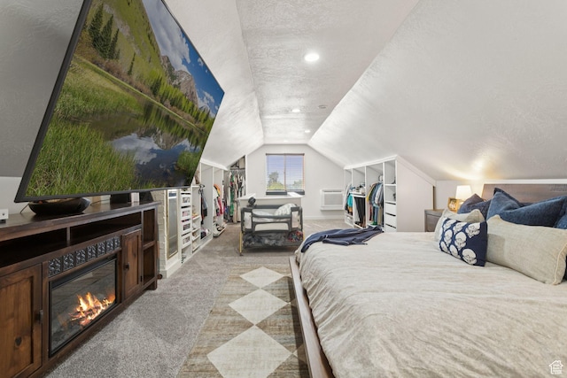 175 Grove Creek Dr N, Pleasant Grove, UT 84062 - bedroom with light carpet, lofted ceiling, a textured ceiling, a fireplace, and a wall unit AC