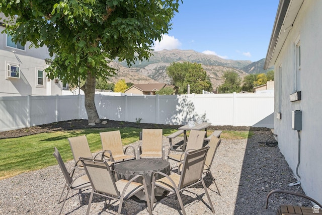 175 Grove Creek Dr N, Pleasant Grove, UT 84062 - fenced backyard featuring a mountain view and a fire pit