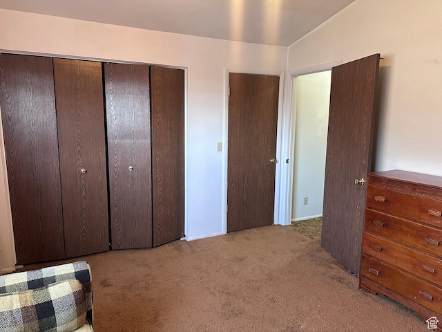1780 W Homestead Farms Ln S Unit 2, West Valley City, UT 84119 - carpeted bedroom featuring vaulted ceiling and a closet