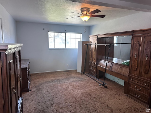 1780 W Homestead Farms Ln S Unit 2, West Valley City, UT 84119 - unfurnished bedroom featuring carpet floors, a ceiling fan, and a textured ceiling