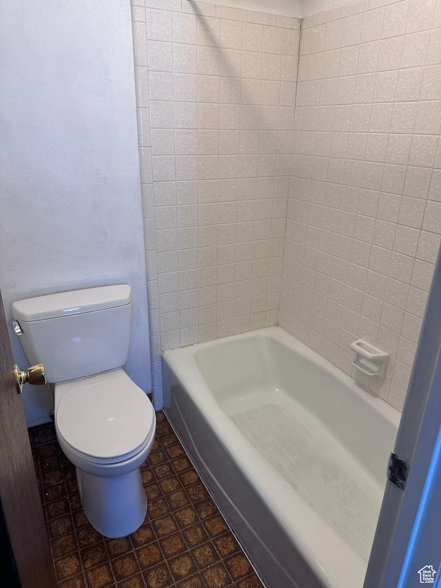 1780 W Homestead Farms Ln S Unit 2, West Valley City, UT 84119 - full bathroom featuring toilet and tile patterned flooring