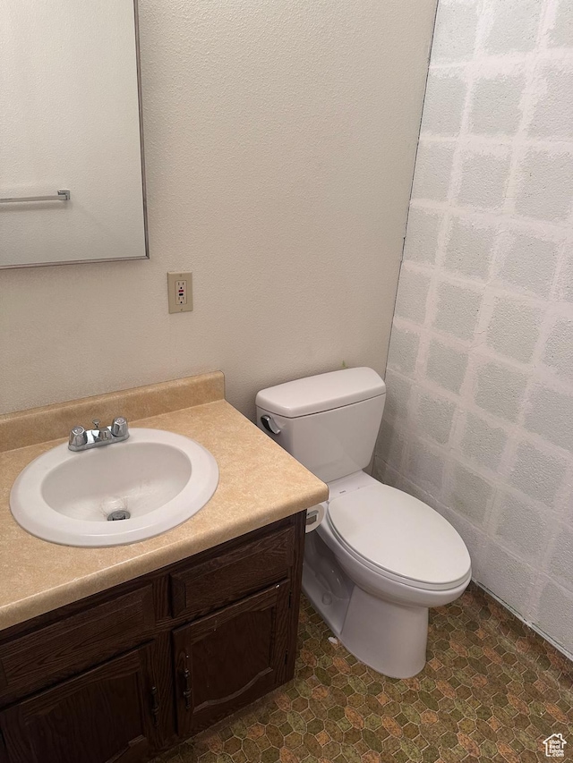 1780 W Homestead Farms Ln S Unit 2, West Valley City, UT 84119 - half bathroom featuring vanity and tile patterned floors