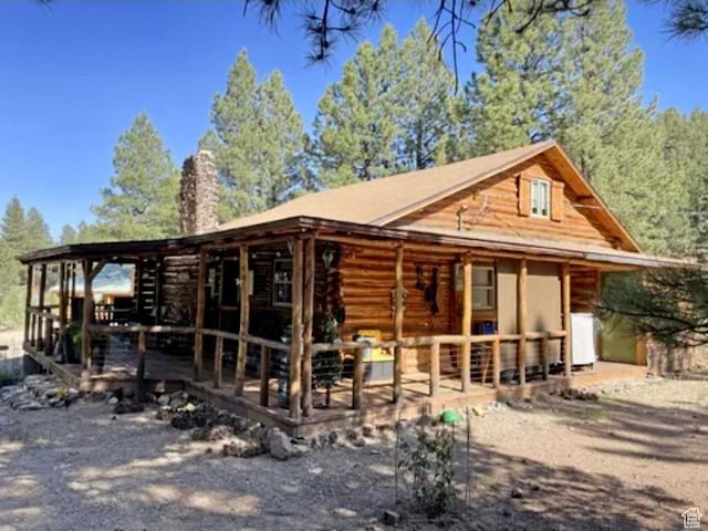 260 E Jensen Trl, Hatch, UT 84735 - rear view of house with a chimney