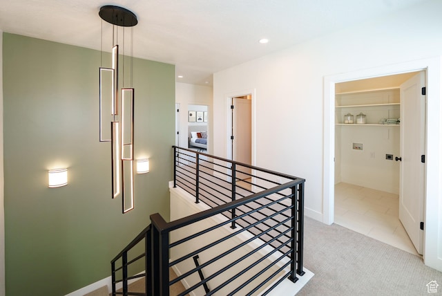 11378 S Aqua St W Unit 229, South Jordan, UT 84009 - hall with an upstairs landing, carpet floors, and recessed lighting