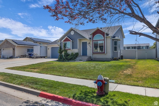 3820 Foxglen Dr, Roy, UT 84067 - ranch-style house featuring concrete driveway, brick siding, a gate, and an attached garage
