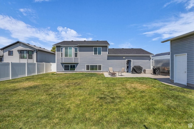 3820 Foxglen Dr, Roy, UT 84067 - rear view of property featuring a patio and a fire pit