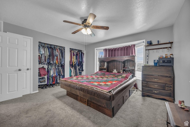 3820 Foxglen Dr, Roy, UT 84067 - carpeted bedroom featuring a textured ceiling, a ceiling fan, and a closet