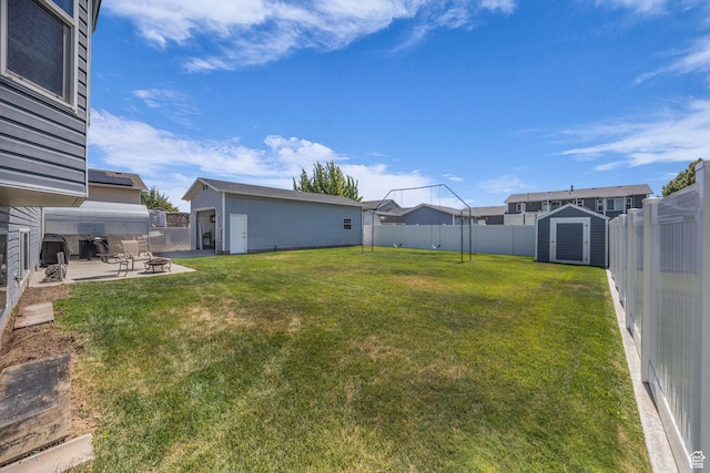 3820 Foxglen Dr, Roy, UT 84067 - fenced backyard with an outdoor fire pit, a patio area, and a storage unit