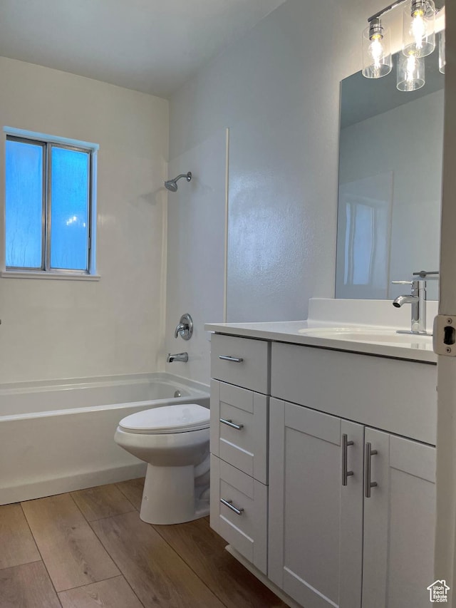 1455 N Amiron Way Unit A, Orem, UT 84057 - bathroom featuring vanity, tub / shower combination, wood finished floors, and a chandelier