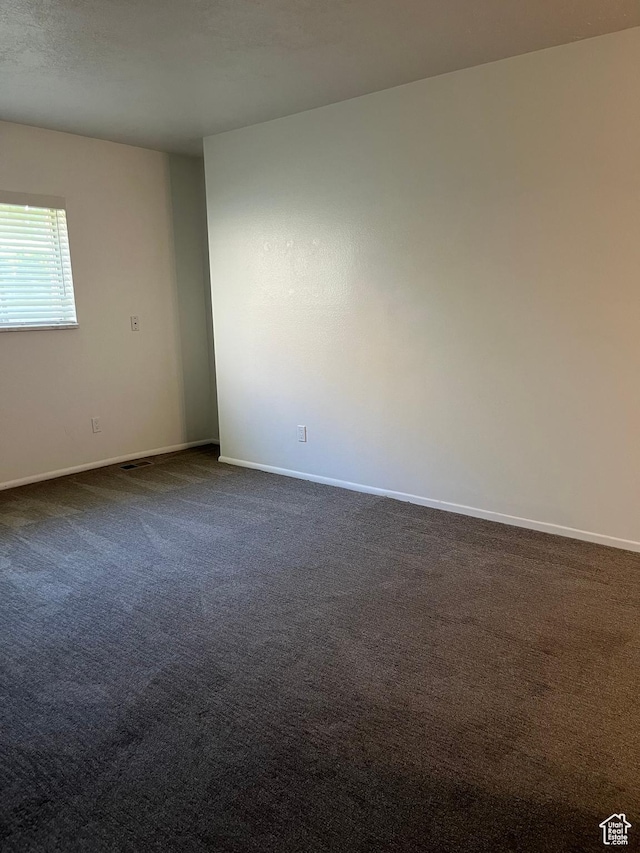 1455 N Amiron Way Unit A, Orem, UT 84057 - unfurnished room featuring dark colored carpet and baseboards