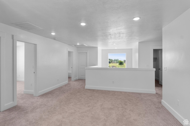 201 E 580 N, Providence, UT 84332 - empty room with light carpet, recessed lighting, and attic access