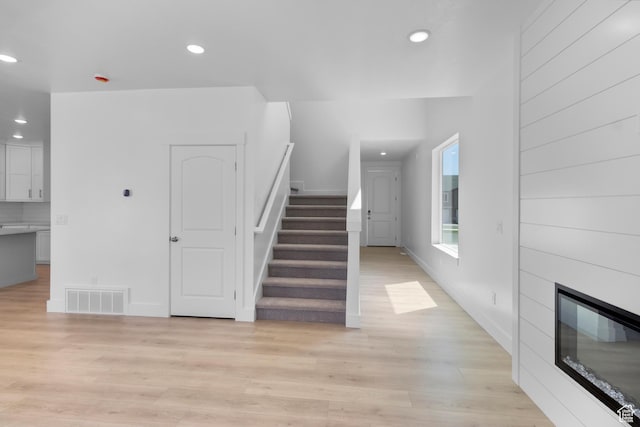 201 E 580 N, Providence, UT 84332 - stairs featuring recessed lighting, wood finished floors, and a large fireplace