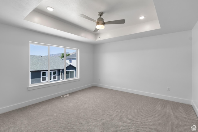 201 E 580 N, Providence, UT 84332 - carpeted empty room featuring a tray ceiling, ceiling fan, and recessed lighting