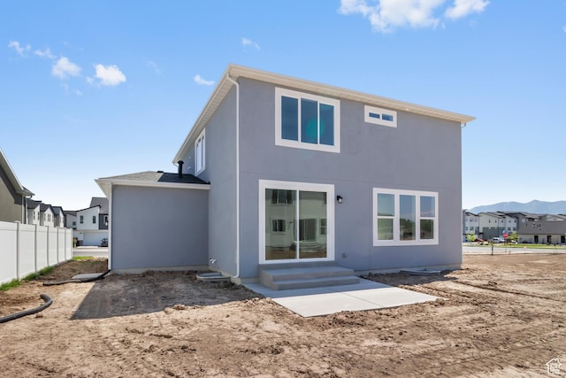 201 E 580 N, Providence, UT 84332 - back of property with entry steps, a residential view, and stucco siding