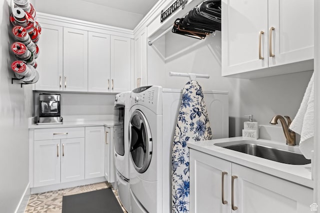 2918 E Willow Tree Ln, St George, UT 84790 - laundry room featuring cabinet space and washer and clothes dryer
