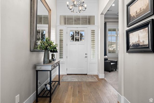2918 E Willow Tree Ln, St George, UT 84790 - entryway with a chandelier and hardwood / wood-style flooring