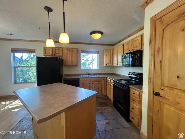 1729 Fox Bay Dr Unit J201, Heber City, UT 84032 - kitchen featuring black appliances, a textured ceiling, ornamental molding, a center island, and hanging light fixtures