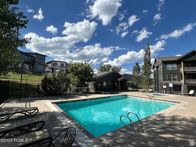 1729 Fox Bay Dr Unit J201, Heber City, UT 84032 - community pool with a patio area and a residential view