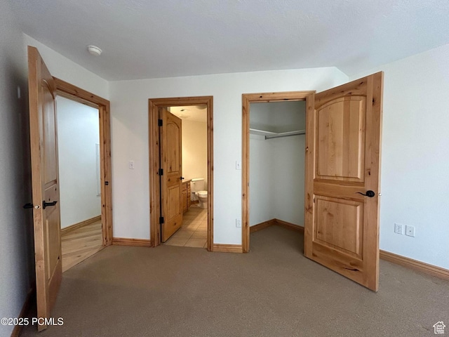 1729 Fox Bay Dr Unit J201, Heber City, UT 84032 - unfurnished bedroom featuring light carpet and connected bathroom
