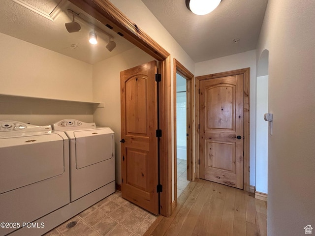 1729 Fox Bay Dr Unit J201, Heber City, UT 84032 - washroom with separate washer and dryer and light wood-style floors