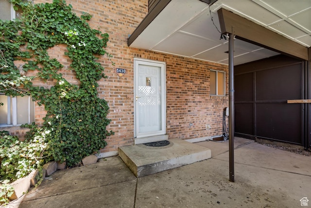 5430 S 850 E, South Ogden, UT 84405 - property entrance with brick siding and a patio area