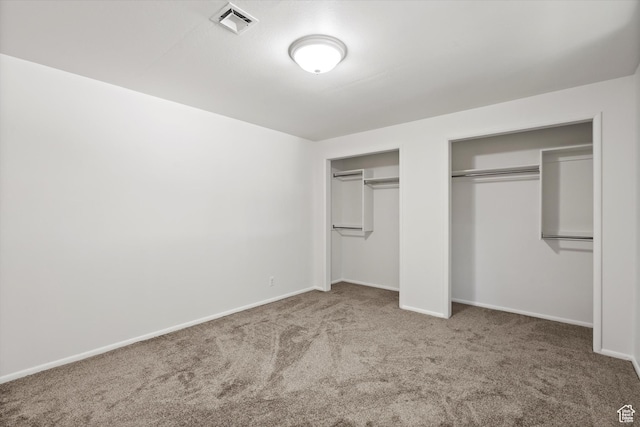 5430 S 850 E, South Ogden, UT 84405 - unfurnished bedroom featuring two closets and carpet