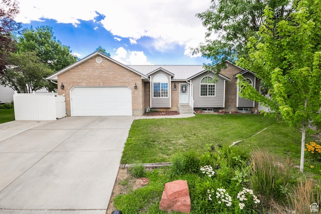 373 S 3240 W, Vernal, UT 84078 - ranch-style house featuring driveway, brick siding, and a garage