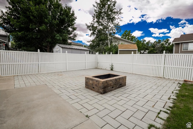 373 S 3240 W, Vernal, UT 84078 - fenced backyard featuring a patio and a fire pit
