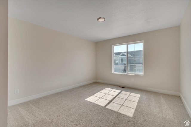 9728 N Aaron Ave Unit 115, Eagle Mountain, UT 84005 - carpeted spare room with baseboards