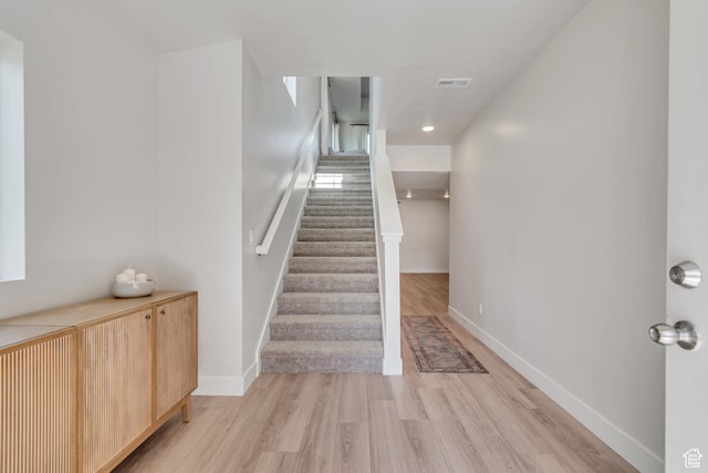 9728 N Aaron Ave Unit 115, Eagle Mountain, UT 84005 - stairway with wood finished floors