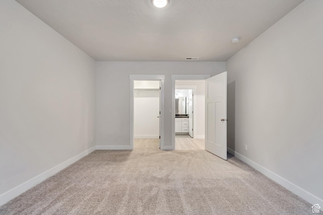 9728 N Aaron Ave Unit 115, Eagle Mountain, UT 84005 - unfurnished room featuring light colored carpet and a smoke detector