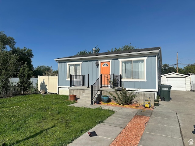 1540 S 900 W, Salt Lake City, UT 84104 - manufactured / mobile home featuring an outbuilding, a detached garage, and board and batten siding