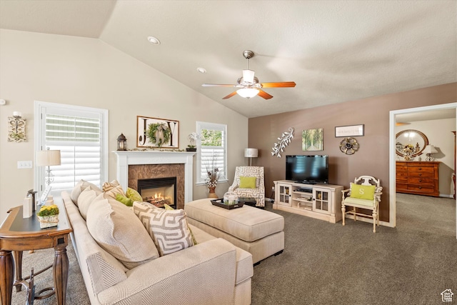 2265 N 515 E, North Ogden, UT 84414 - carpeted living room with vaulted ceiling, ceiling fan, and a tile fireplace
