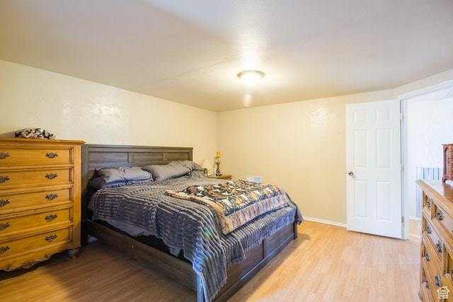 3165 E 5300 S, Vernal, UT 84078 - bedroom featuring light wood-style flooring and baseboards