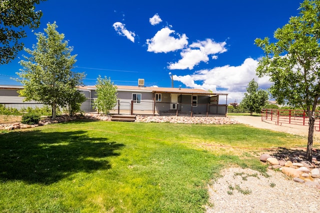 3165 E 5300 S, Vernal, UT 84078 - back of house featuring a lawn