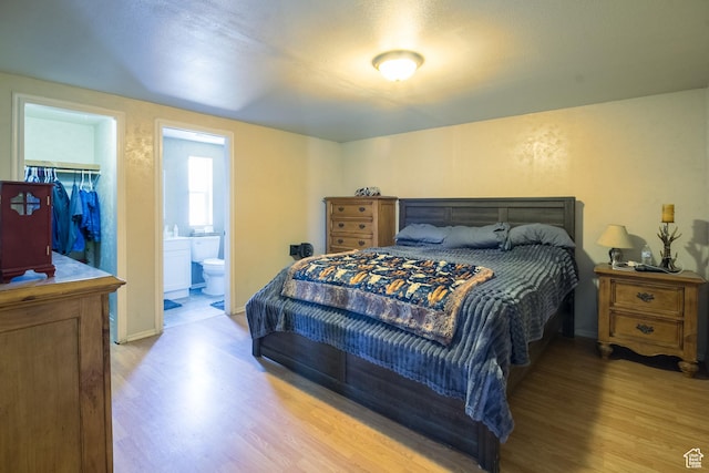 3165 E 5300 S, Vernal, UT 84078 - bedroom featuring wood finished floors and ensuite bath