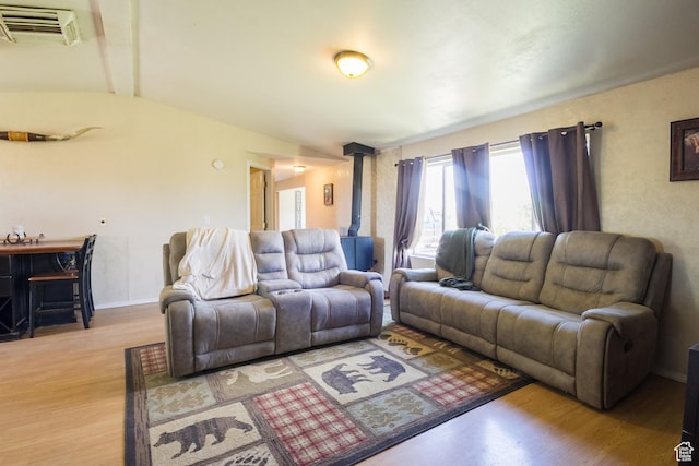 3165 E 5300 S, Vernal, UT 84078 - living area featuring a wood stove and wood finished floors