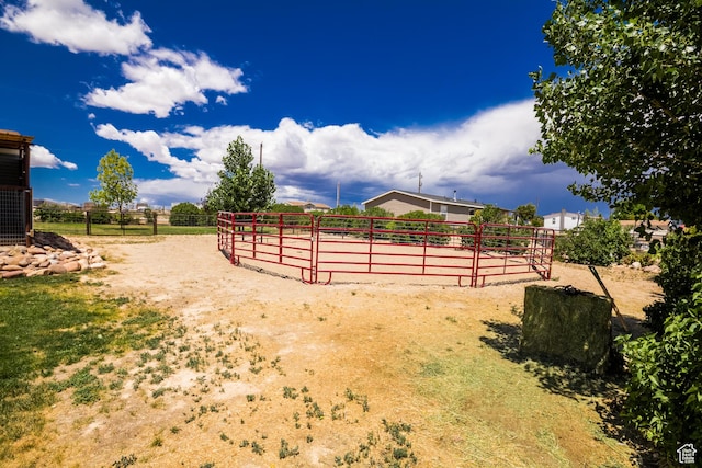 3165 E 5300 S, Vernal, UT 84078 - view of yard featuring an exterior structure, a rural view, an outdoor riding arena, and an outdoor structure