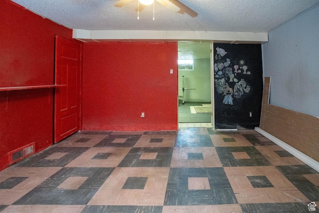 129 N 100 E, Ephraim, UT 84627 - spare room with a textured ceiling, ceiling fan, and tile patterned floors