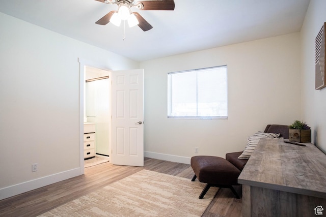 129 N 100 E, Ephraim, UT 84627 - living area featuring wood finished floors and ceiling fan