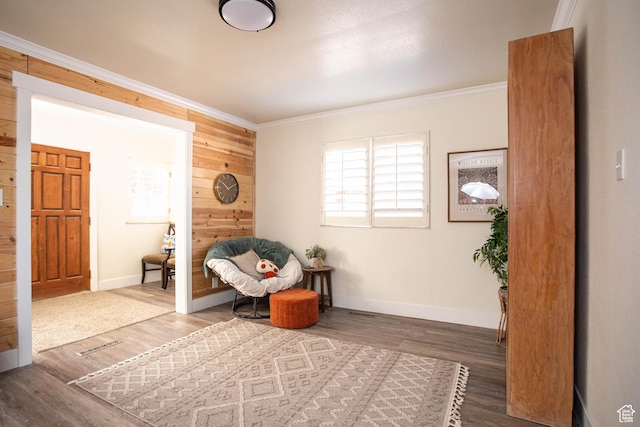 129 N 100 E, Ephraim, UT 84627 - sitting room with wood finished floors, crown molding, and wooden walls