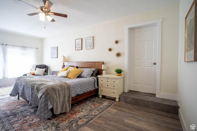 129 N 100 E, Ephraim, UT 84627 - bedroom with dark wood-style flooring and a ceiling fan