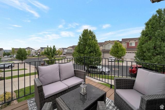5198 W Courtly Ln, Herriman, UT 84096 - deck featuring a residential view, an outdoor hangout area, and a garage