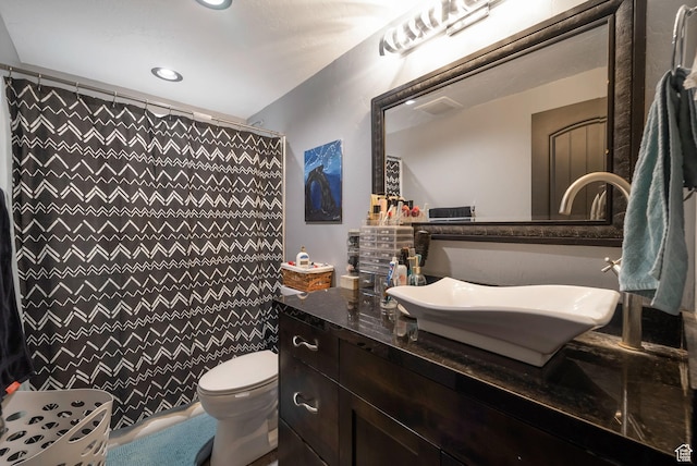 5198 W Courtly Ln, Herriman, UT 84096 - bathroom featuring vanity, recessed lighting, and a shower with shower curtain