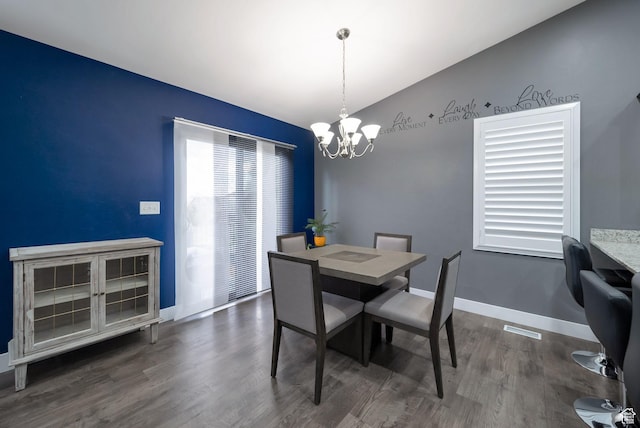 5198 W Courtly Ln, Herriman, UT 84096 - dining room with vaulted ceiling, a chandelier, and dark wood-style flooring