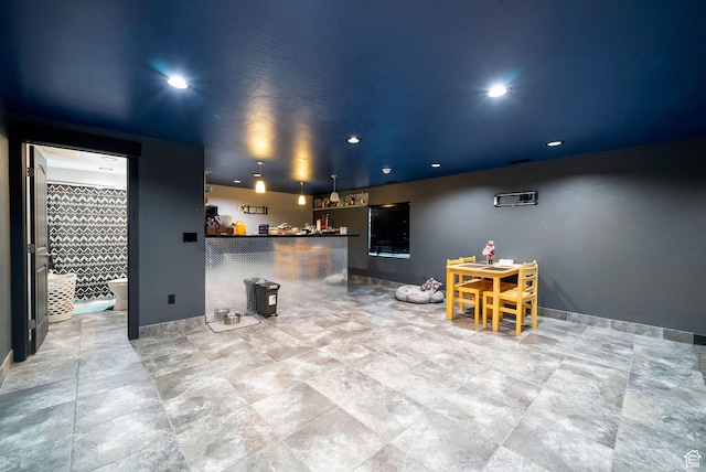 5198 W Courtly Ln, Herriman, UT 84096 - living area with a bar and recessed lighting