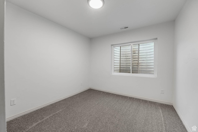 6228 S Waller Ln, West Jordan, UT 84081 - carpeted spare room featuring baseboards