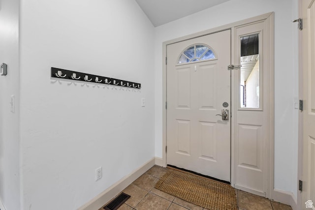 6228 S Waller Ln, West Jordan, UT 84081 - foyer featuring baseboards and light tile patterned floors