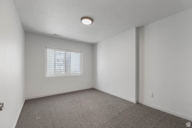 6228 S Waller Ln, West Jordan, UT 84081 - carpeted empty room featuring a textured ceiling and baseboards