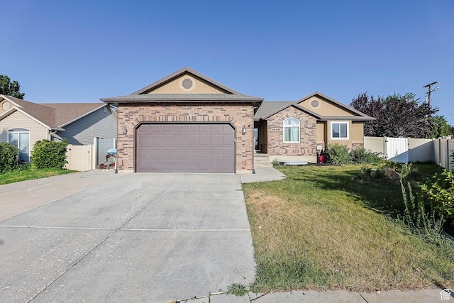 6228 S Waller Ln, West Jordan, UT 84081 - ranch-style home with an attached garage, driveway, brick siding, and a gate